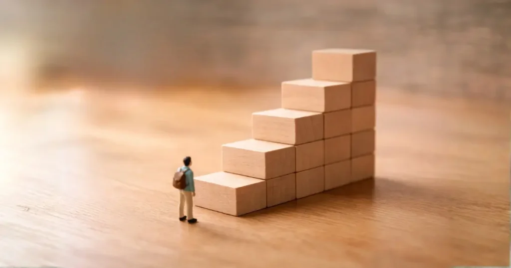 小さな階段を一段ずつ上るイメージ